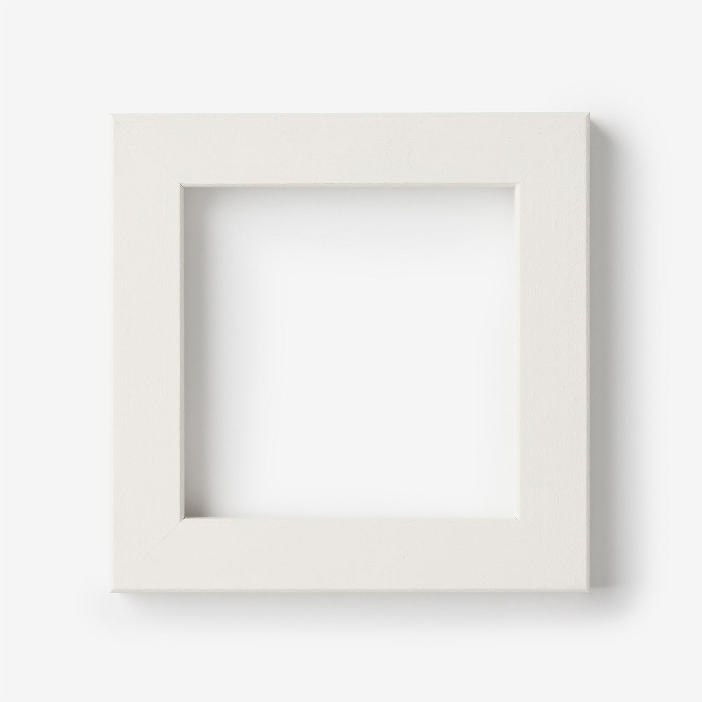 A small square white frame on a white background