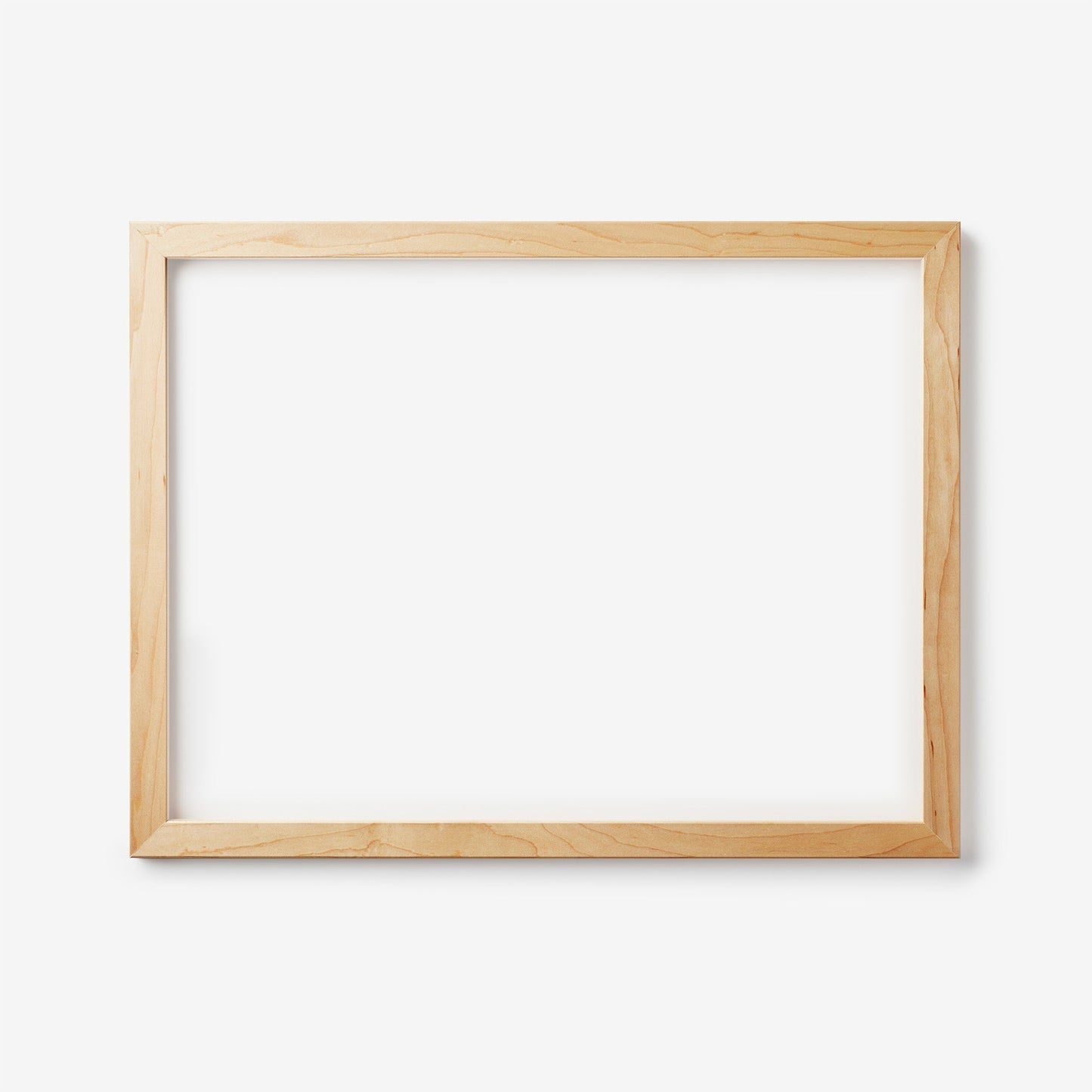 A large rectangular maple wood frame on a white background
