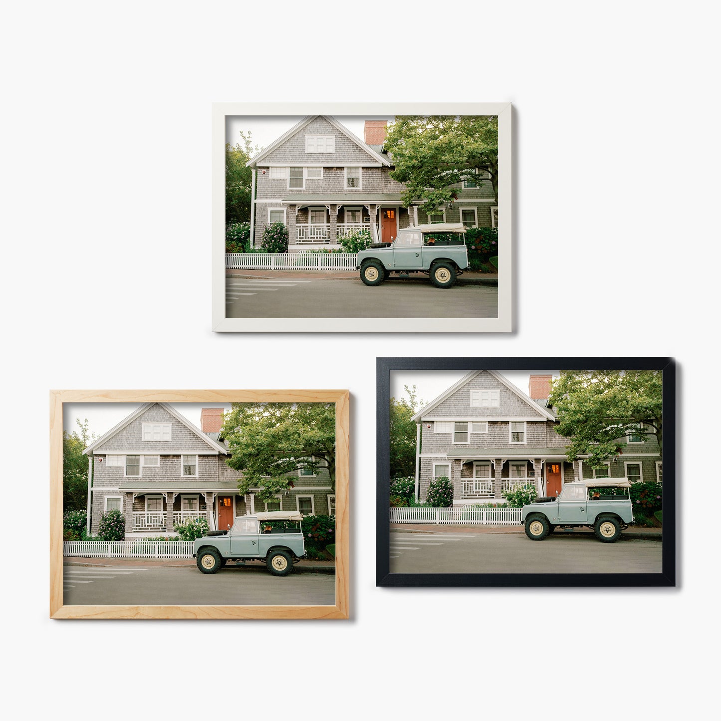 Three framed glass prints of a house and a car on a white background