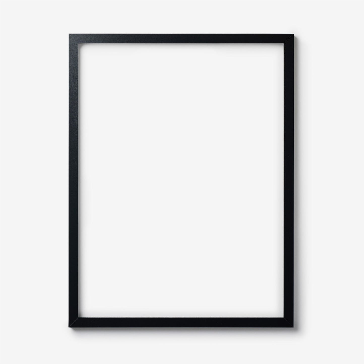 An extra large rectangular black wood frame on a white background