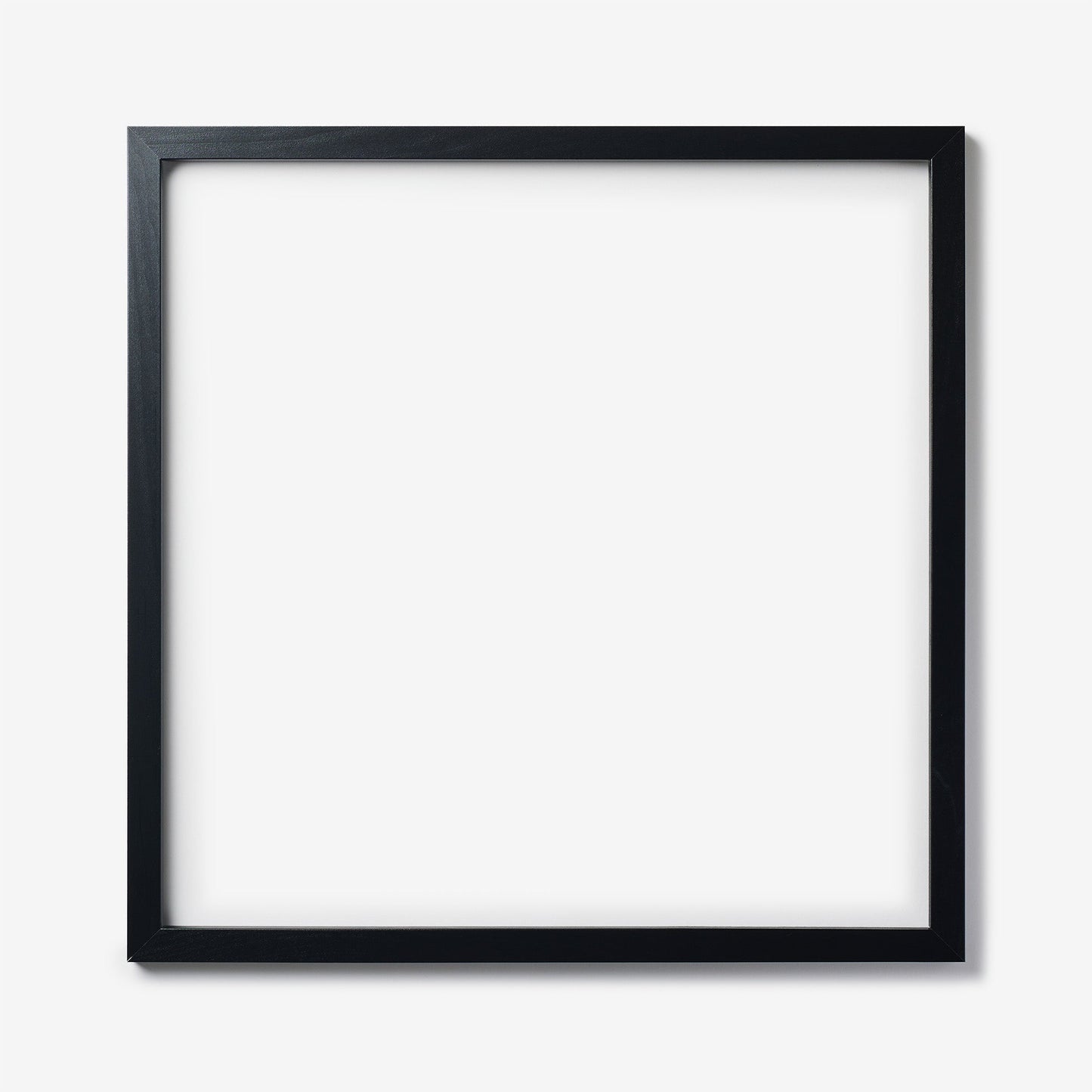 A large square black wood frame on a white background