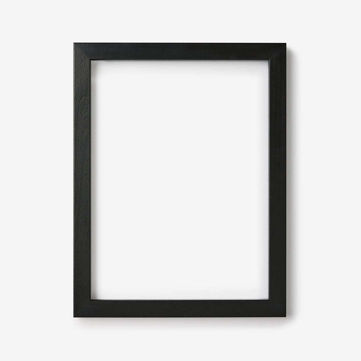 A medium rectangular black wood frame on a white background