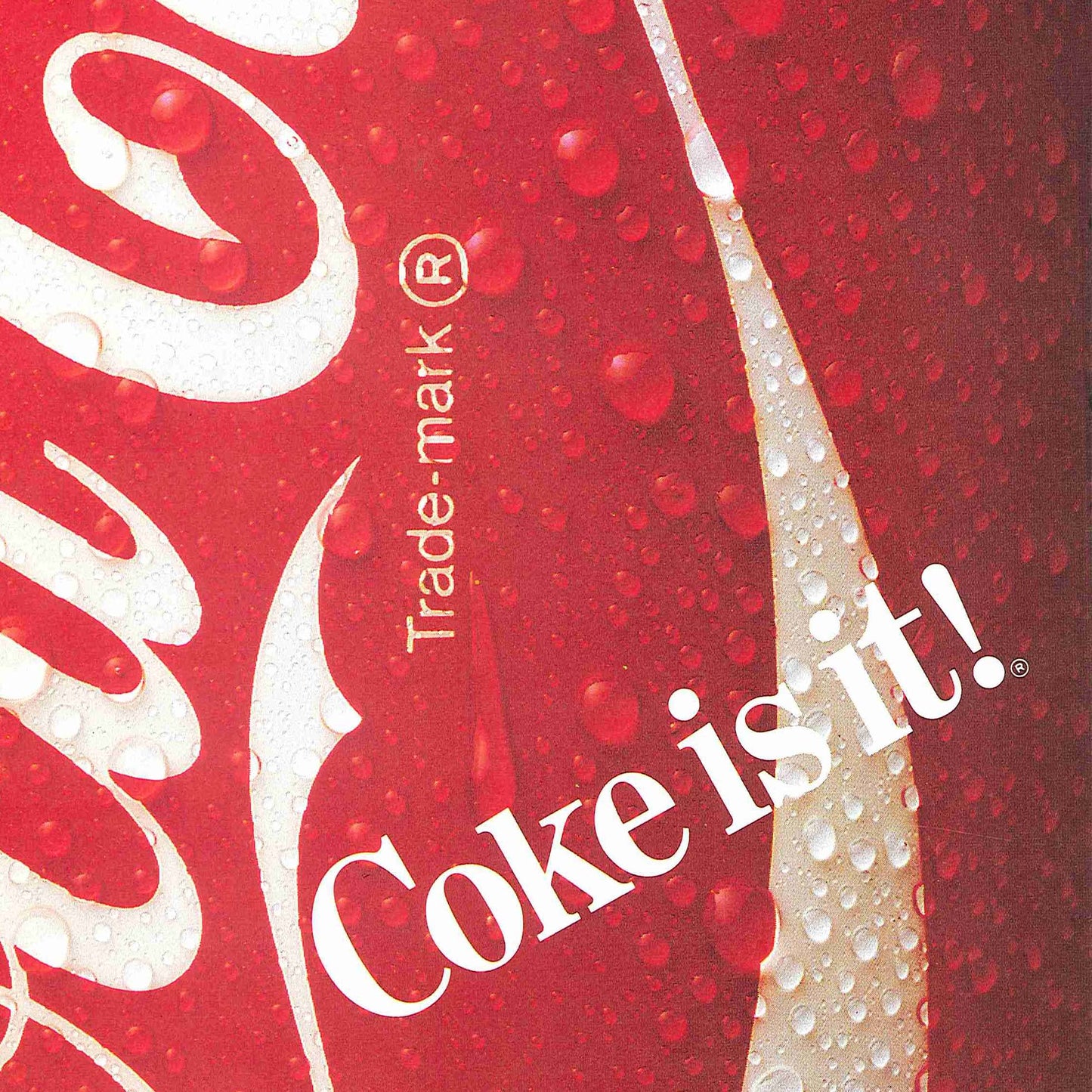 Close up on image of Coca-Cola logo with water droplets on a red can